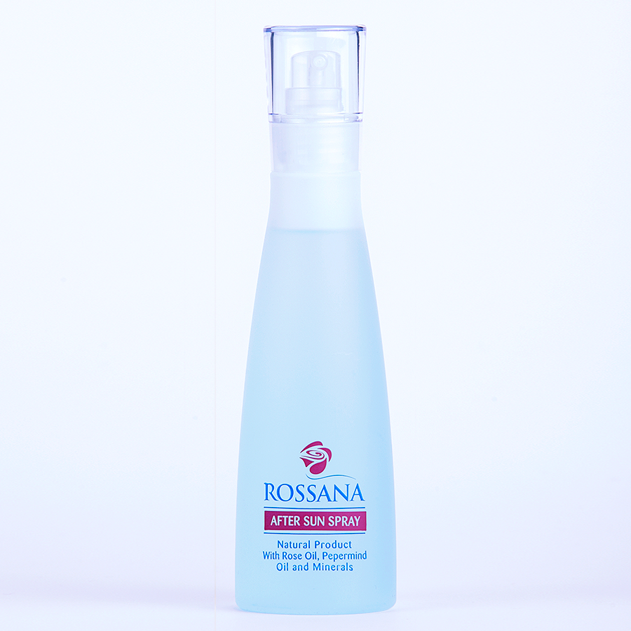 Rossana after-sun spray bottle on a light purple background
