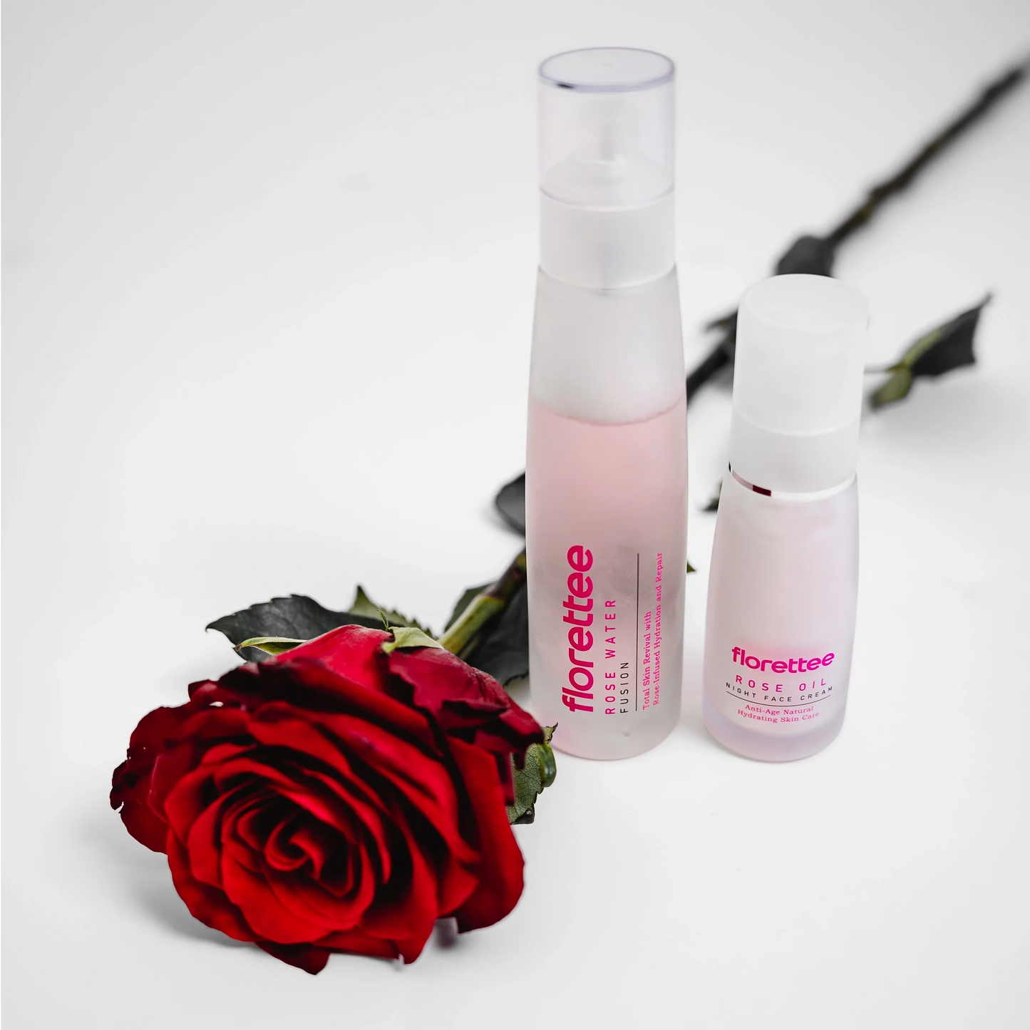 Florettee Rose Water Fusion and Rose Oil Night Face Cream with a red rose on white background